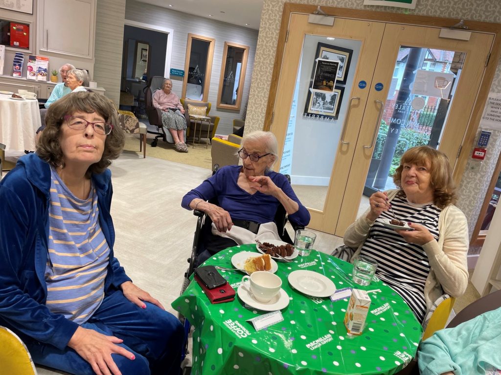 Amberley Care Home residents hosting a Macmillan Coffee Morning