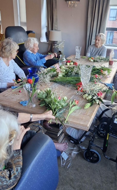 Our residents flower arranging at Amberley Care Home