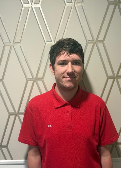 man posing for staff photo