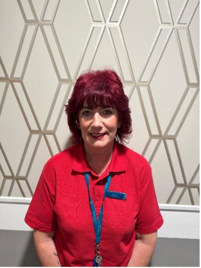 lady posing for staff photo