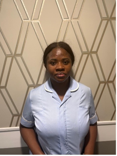 lady posing for staff photo
