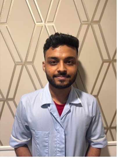 man posing for staff photo