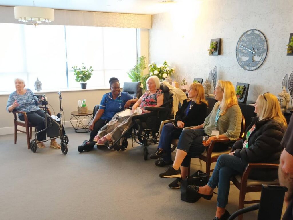 people sat down in the new room